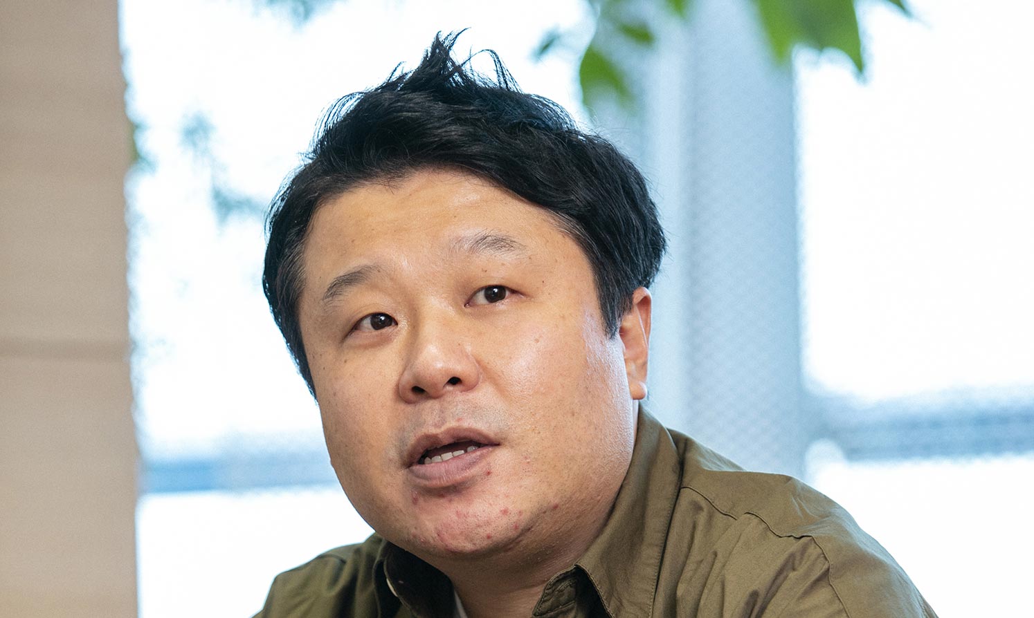 商品企画担当 田中 啓介