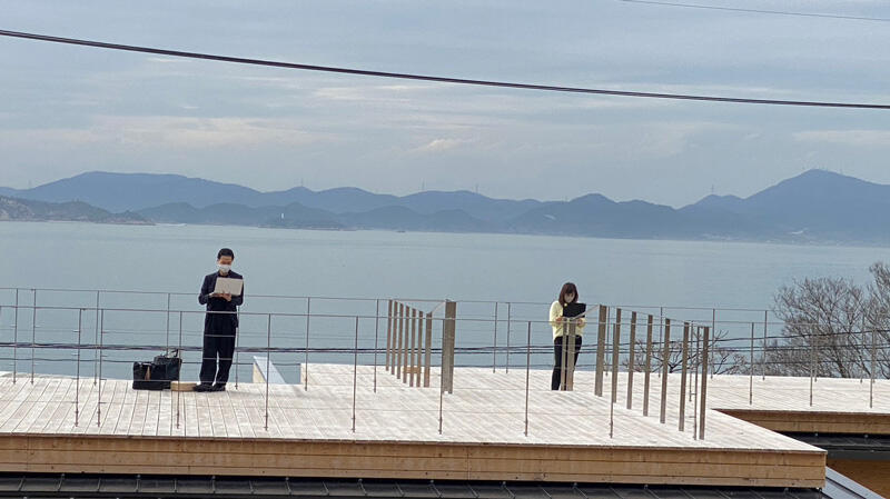 Working with the Seto Inland Sea in the background
