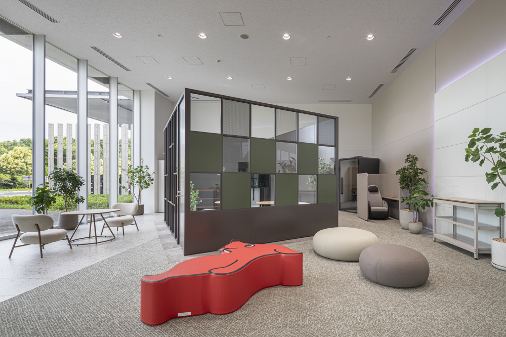 Decorated with calming carpets, sofas, and plants